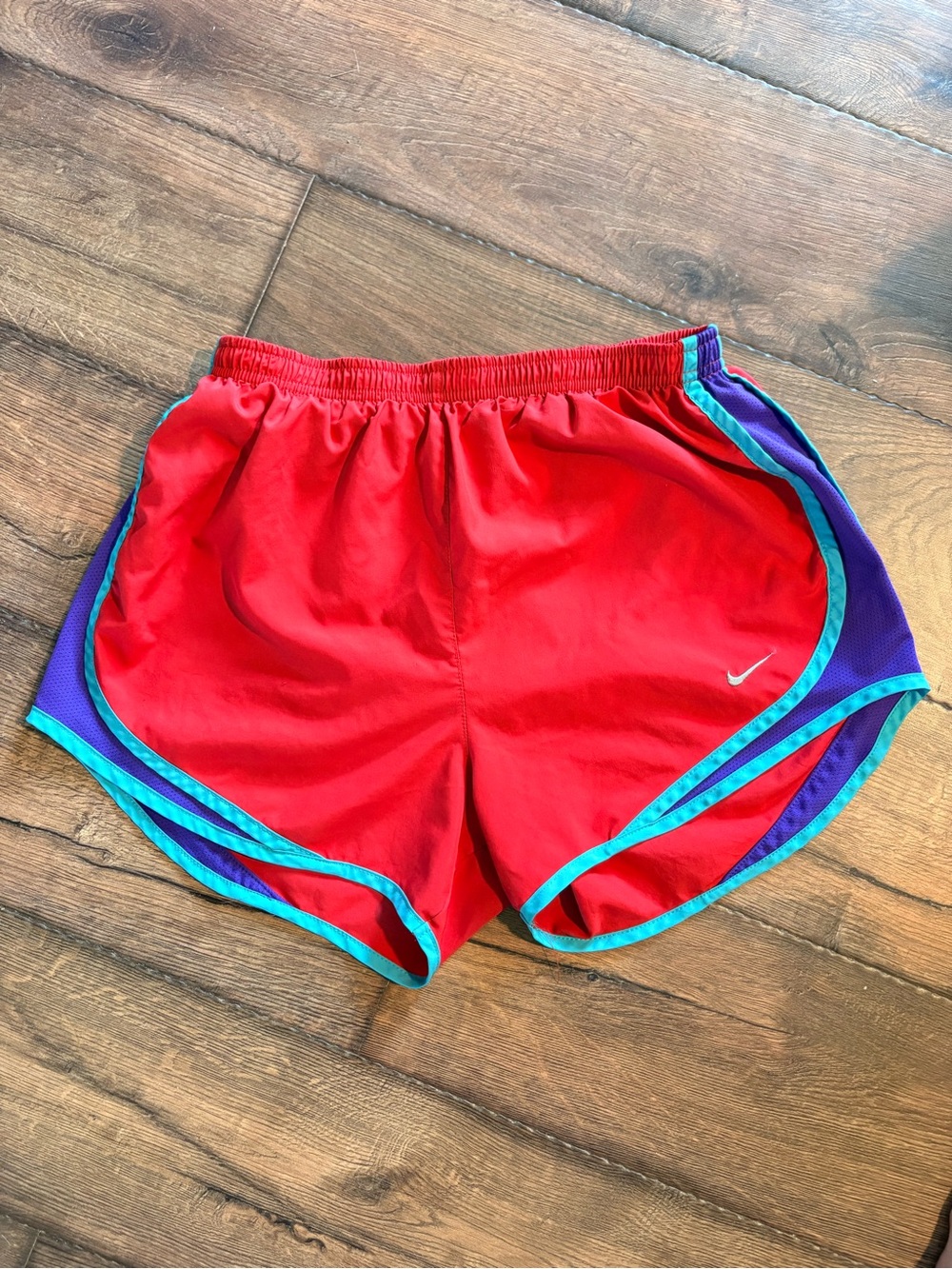 Nike Red Women's Athletic Shorts with Teal Trim and Purple Panels